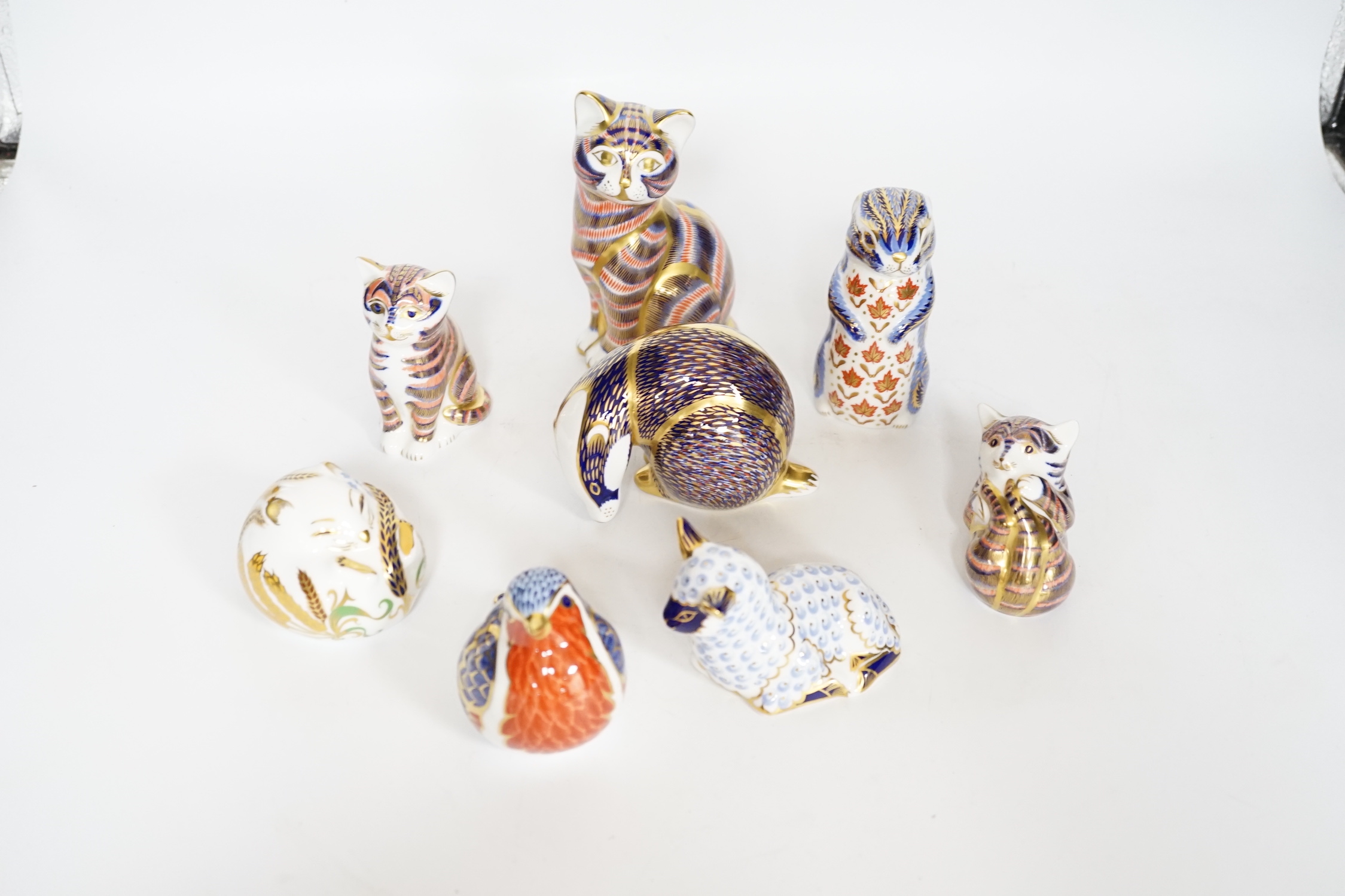 Eight Royal Crown Derby paperweights (all with boxes)